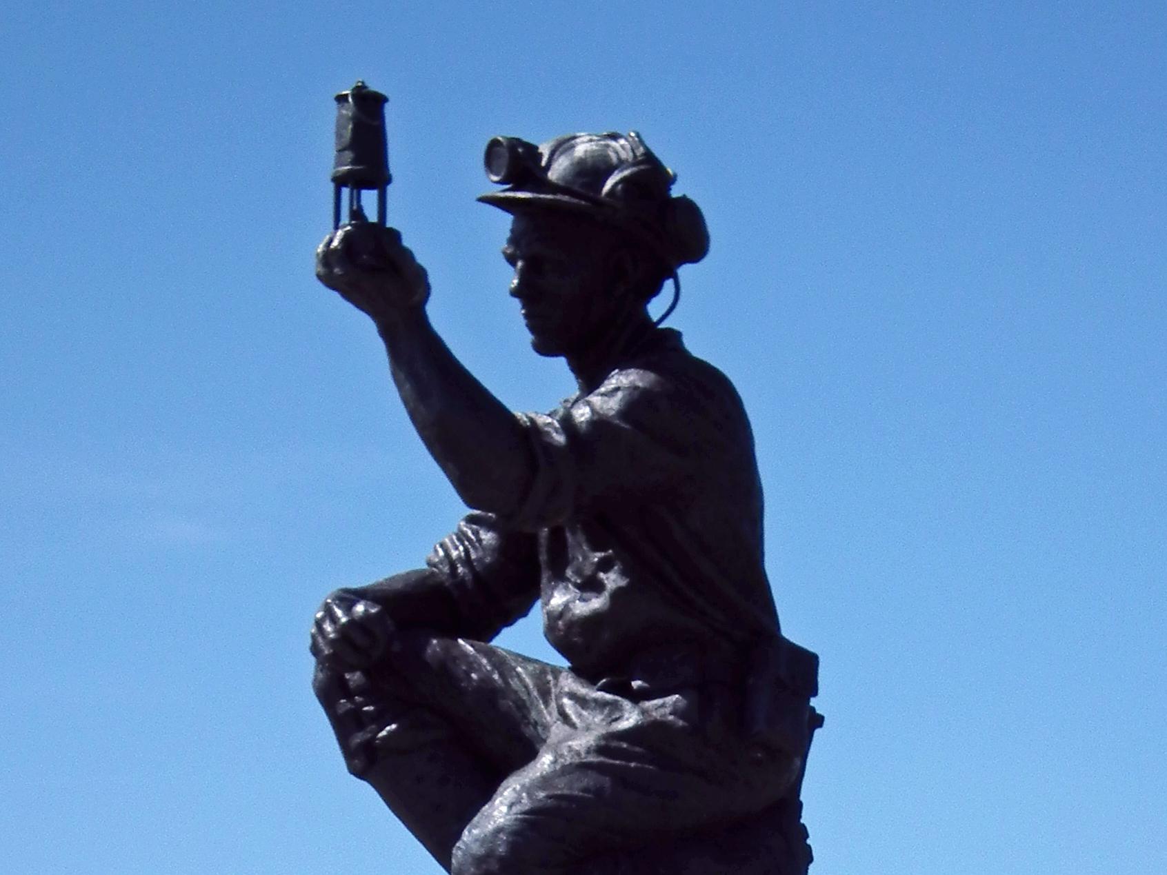 Image for https://media.umbraco.io/dev-discover-ashfield-heartcore/2hkf3hnb/silverhill-wood-miner-statue-small.jpg